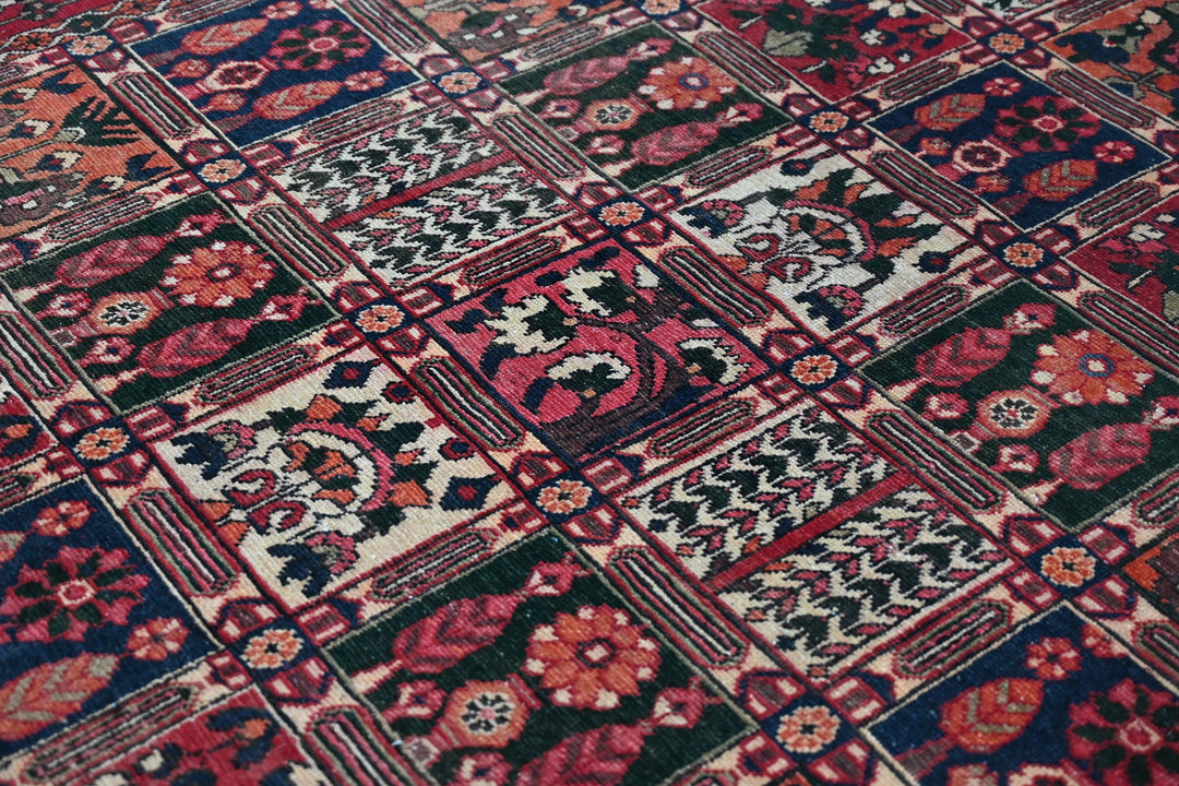 red Medium rug 6' 6" x 9' 4"