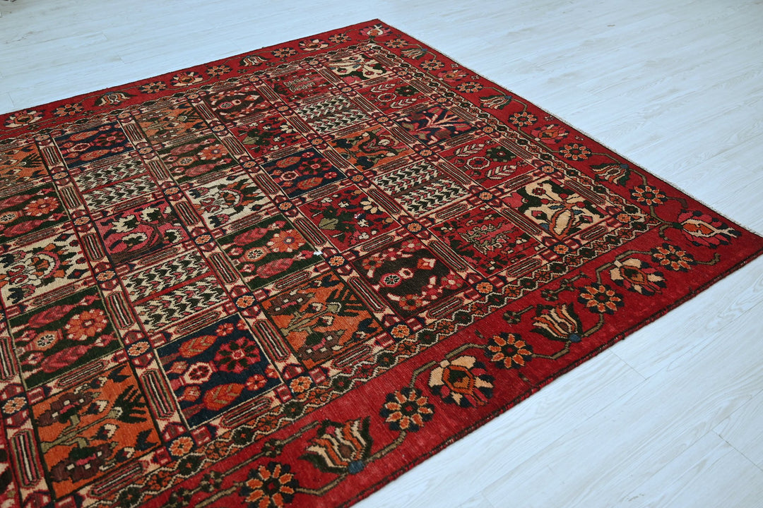 red Medium rug 6' 6" x 9' 4"