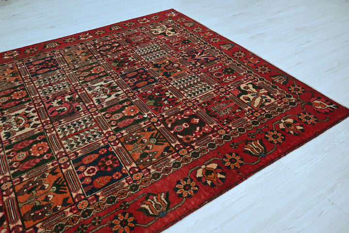 red Medium rug 6' 6" x 9' 4"