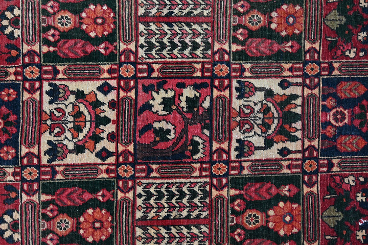 red Medium rug 6' 6" x 9' 4"