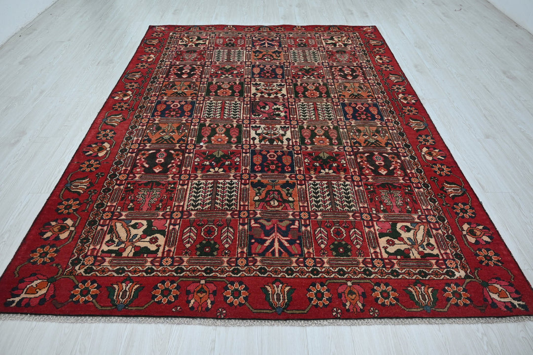 red Medium rug 6' 6" x 9' 4"