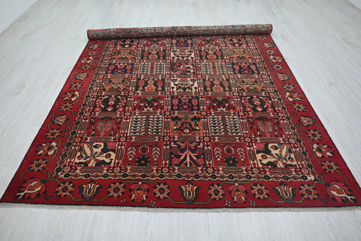 red Medium rug 6' 6" x 9' 4"