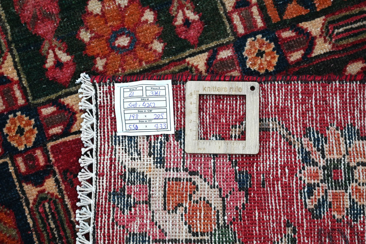 red Medium rug 6' 6" x 9' 4"
