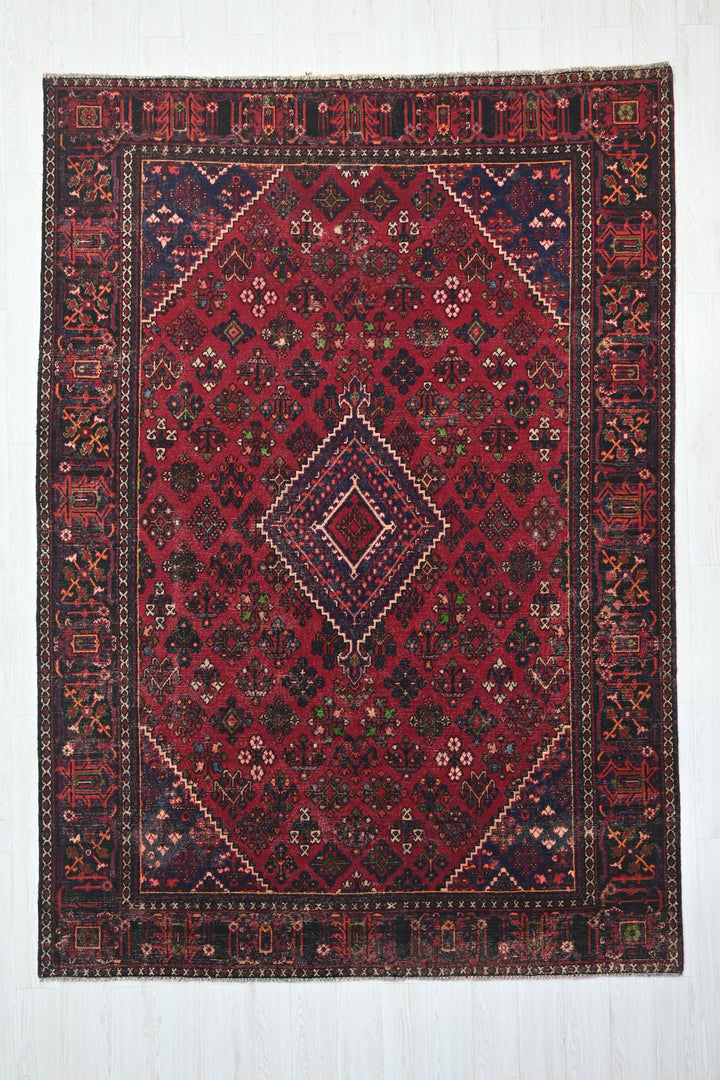 red Large rug 7' 0" x 9' 10"