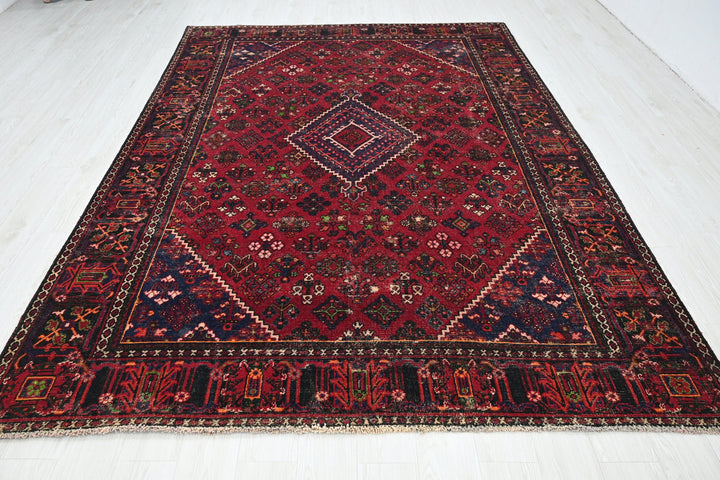 red Large rug 7' 0" x 9' 10"
