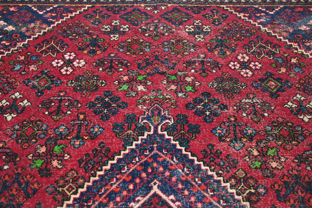 red Large rug 7' 0" x 9' 10"