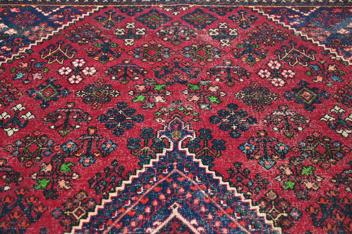 red Large rug 7' 0" x 9' 10"
