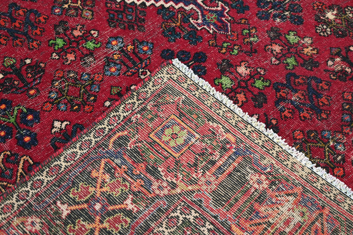red Large rug 7' 0" x 9' 10"