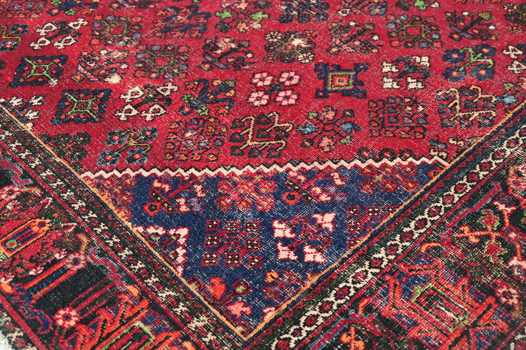 red Large rug 7' 0" x 9' 10"