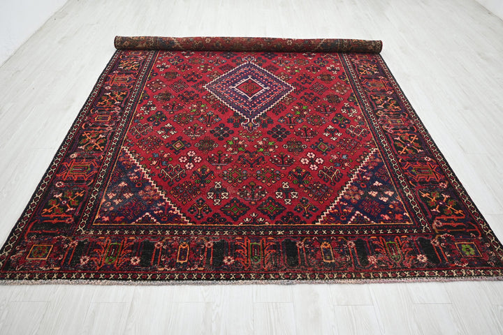 red Large rug 7' 0" x 9' 10"