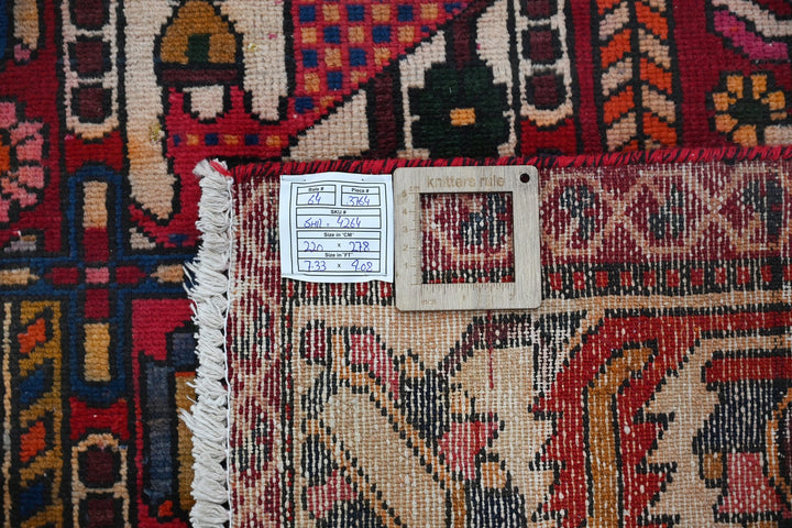 red Large rug 7' 3" x 9' 1"