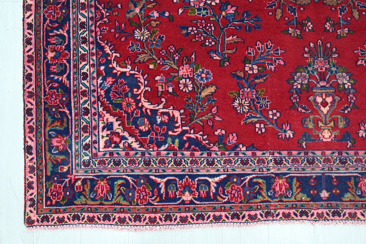 red Large rug 6' 6" x 10' 9"