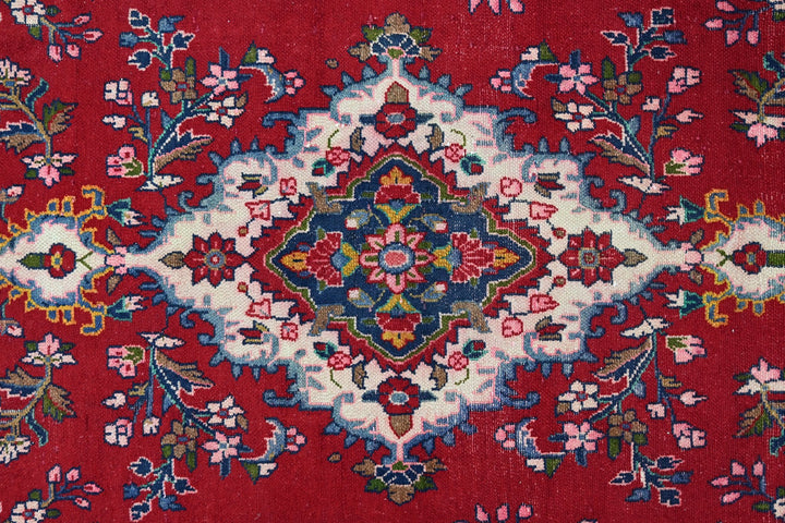 red Large rug 6' 6" x 10' 9"