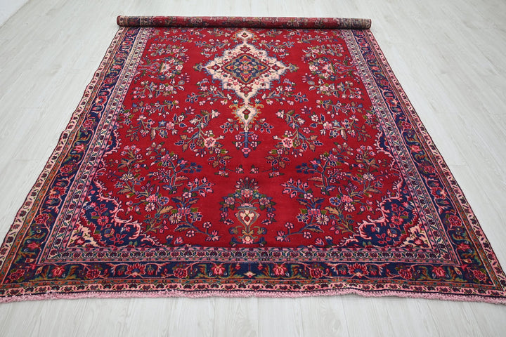 red Large rug 6' 6" x 10' 9"