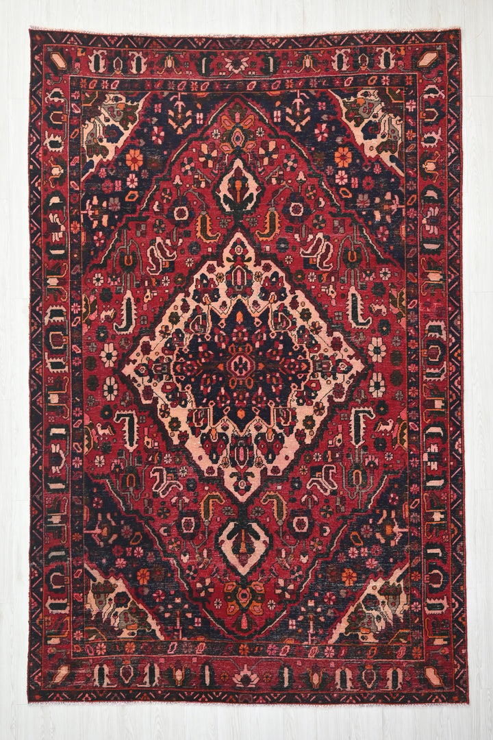 red Large rug 6' 7" x 10' 0"