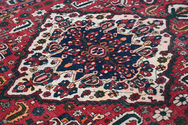 red Large rug 6' 7" x 10' 0"
