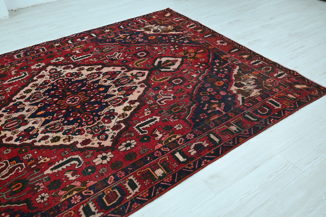 red Large rug 6' 7" x 10' 0"