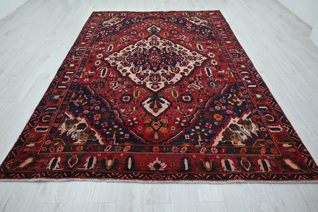 red Large rug 6' 7" x 10' 0"