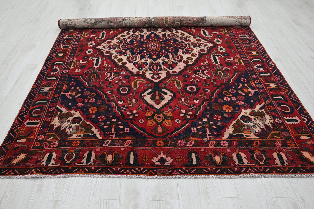 red Large rug 6' 7" x 10' 0"