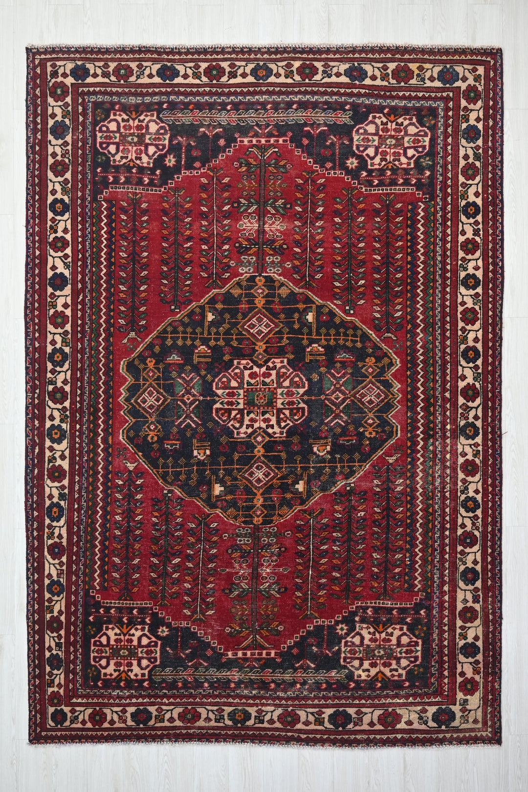 red Large rug 6' 9" x 10' 0"