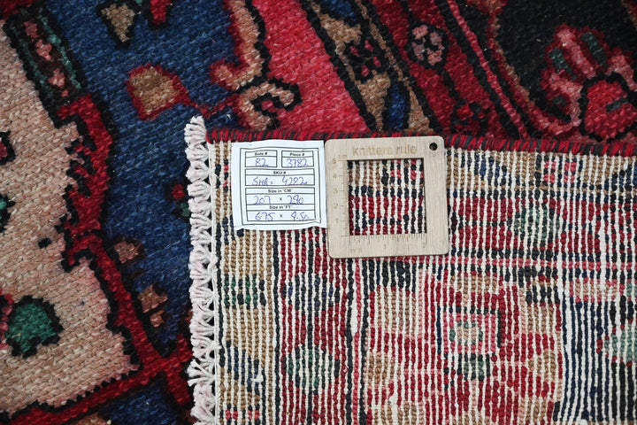 red Large rug 6' 9" x 9' 6"