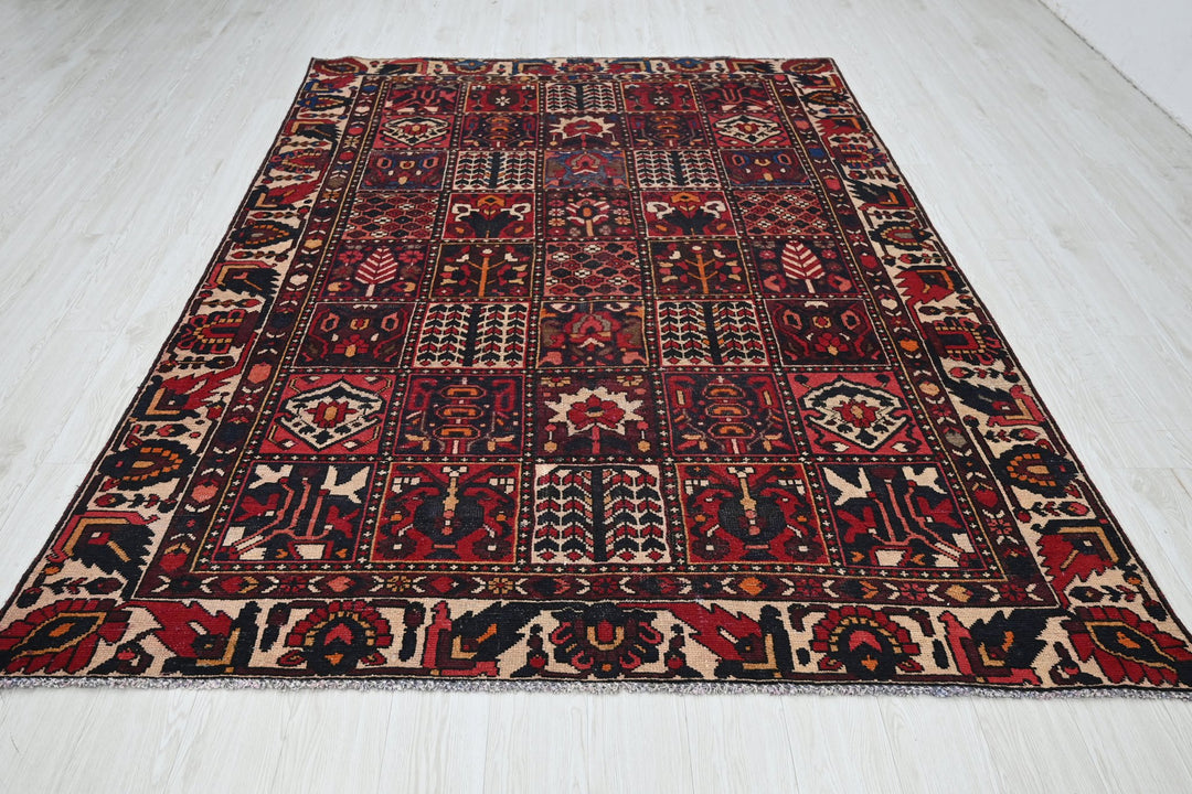 red Medium rug 6' 3" x 9' 0"