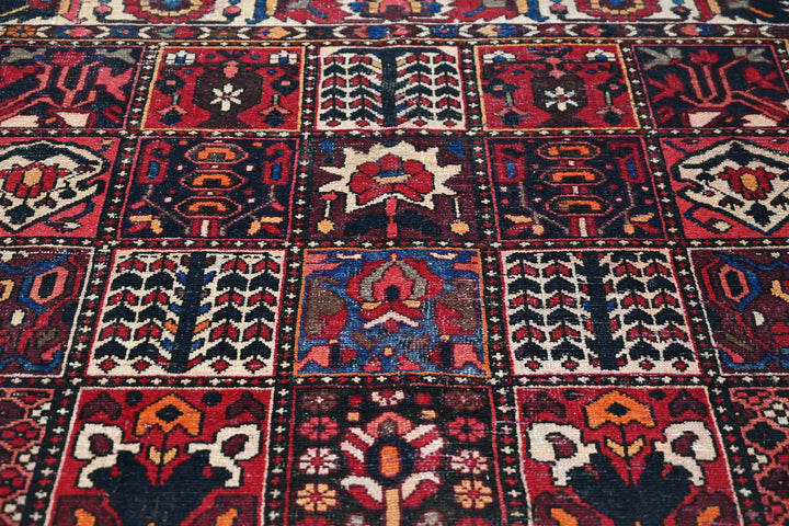red Medium rug 6' 3" x 9' 0"