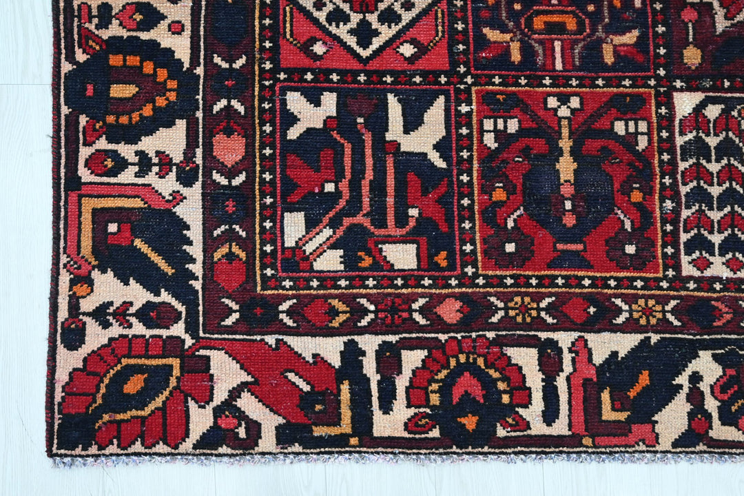 red Medium rug 6' 3" x 9' 0"