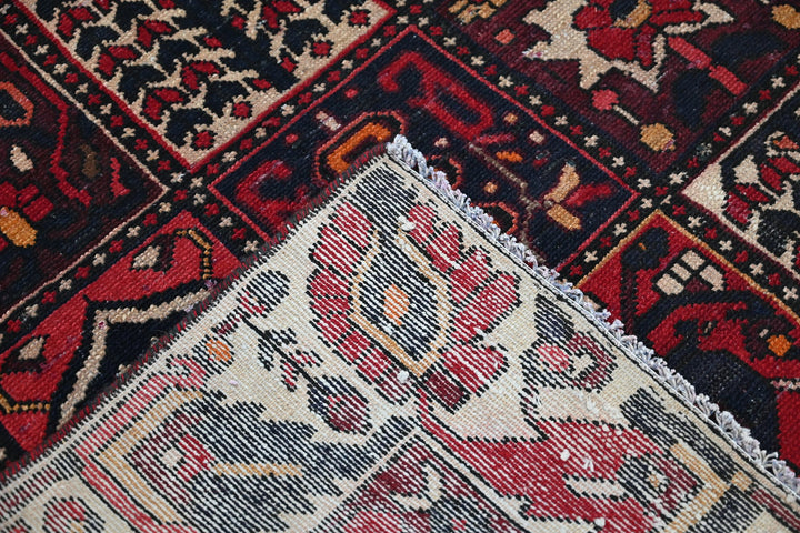 red Medium rug 6' 3" x 9' 0"