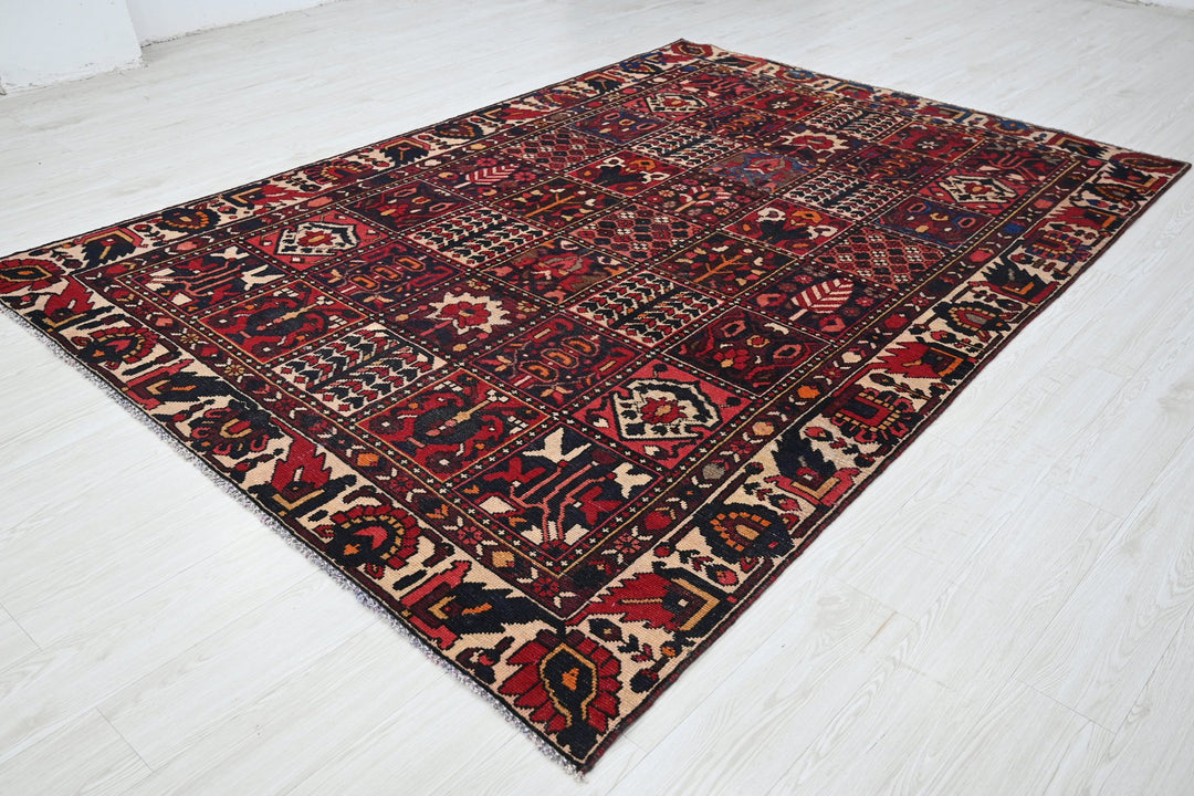 red Medium rug 6' 3" x 9' 0"