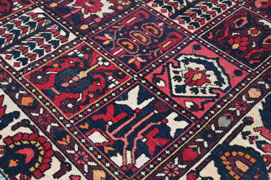 red Medium rug 6' 3" x 9' 0"