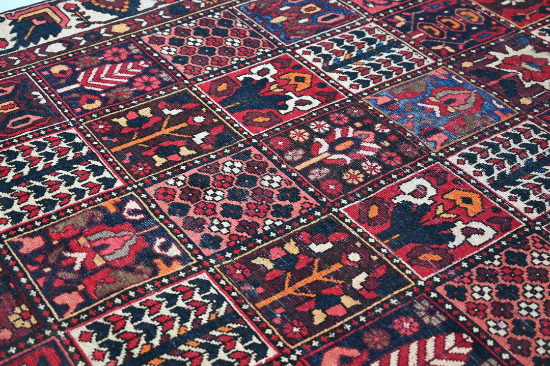 red Medium rug 6' 3" x 9' 0"