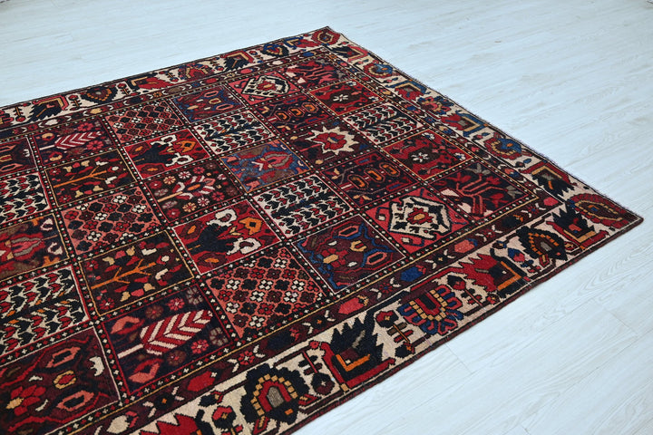 red Medium rug 6' 3" x 9' 0"
