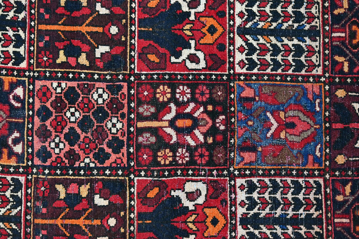 red Medium rug 6' 3" x 9' 0"