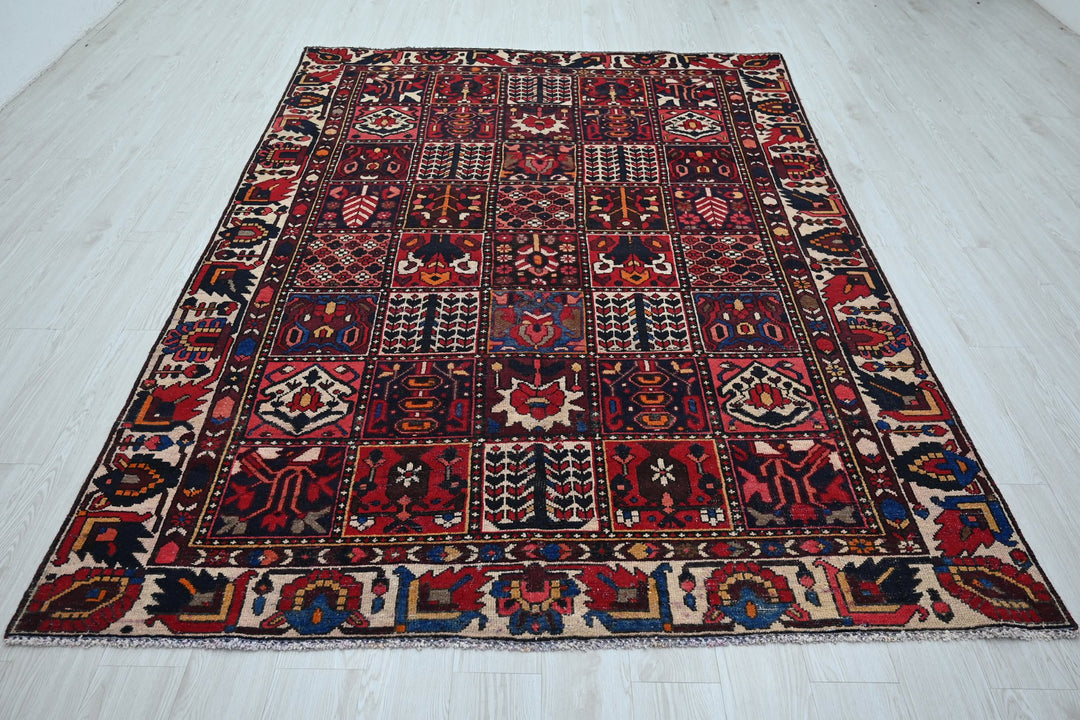 red Medium rug 6' 3" x 9' 0"