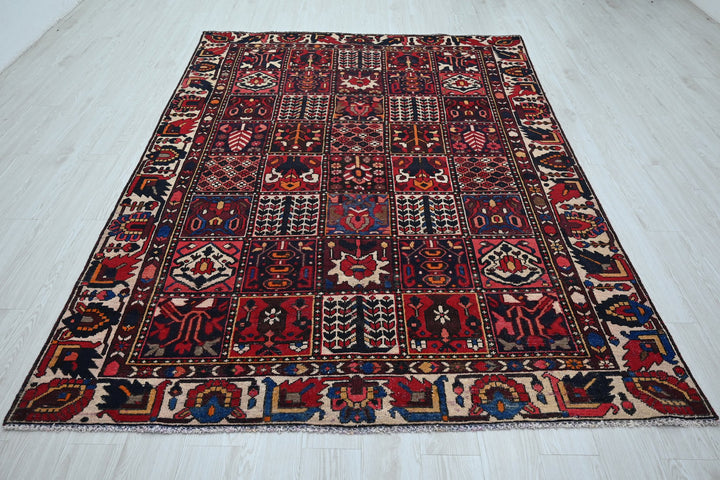 red Medium rug 6' 3" x 9' 0"