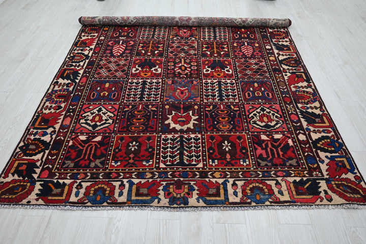 red Medium rug 6' 3" x 9' 0"
