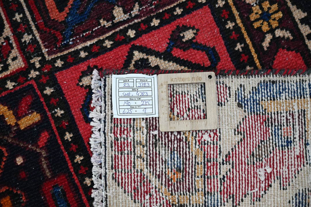 red Medium rug 6' 3" x 9' 0"