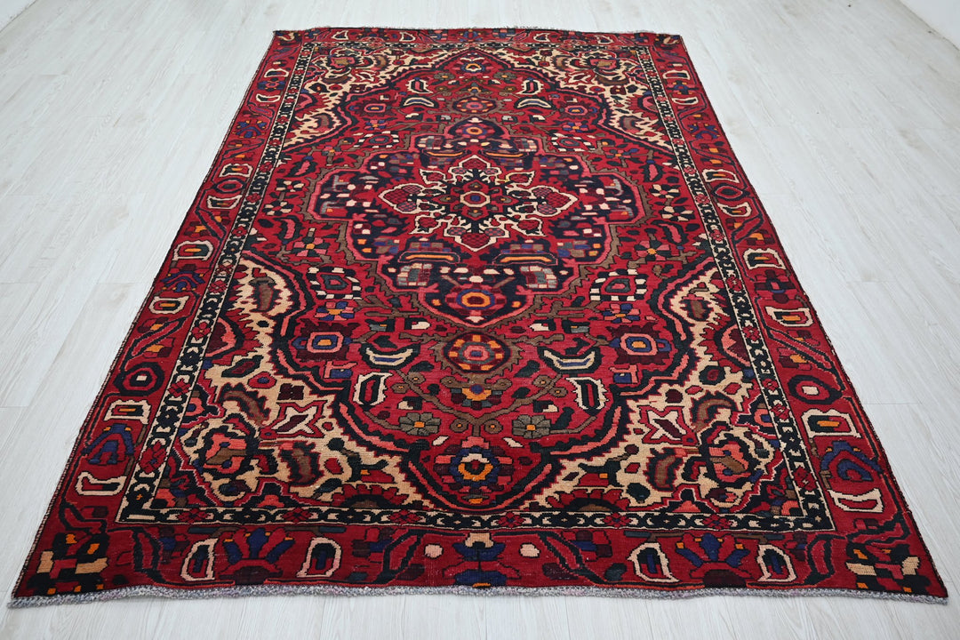 red Medium rug 6' 0" x 9' 0"
