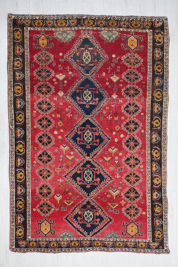 red Medium rug 6' 5" x 9' 4"