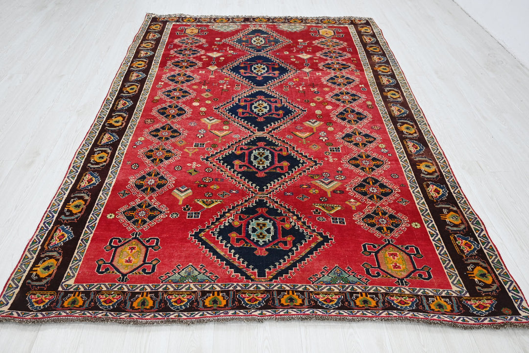 red Medium rug 6' 5" x 9' 4"