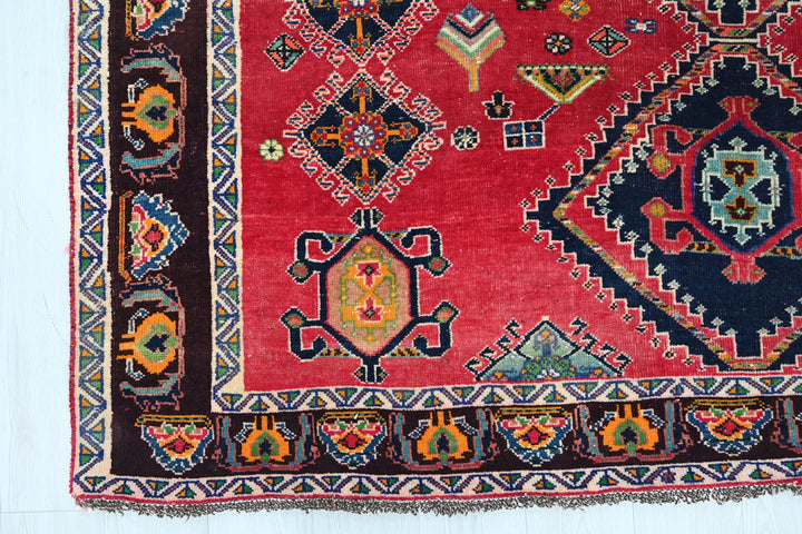 red Medium rug 6' 5" x 9' 4"