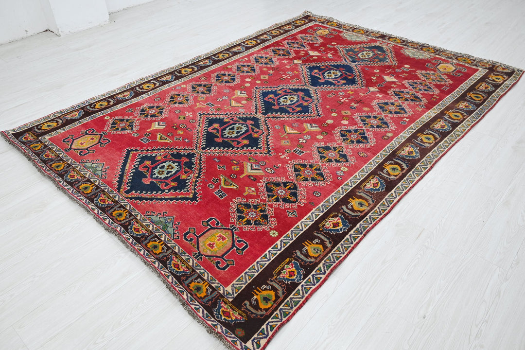 red Medium rug 6' 5" x 9' 4"
