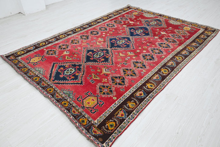red Medium rug 6' 5" x 9' 4"