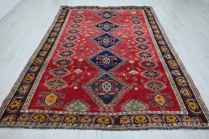 red Medium rug 6' 5" x 9' 4"