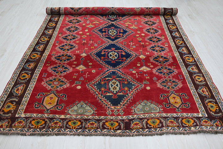 red Medium rug 6' 5" x 9' 4"