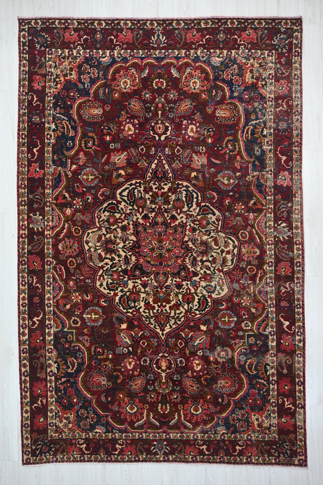 red Large rug 6' 11" x 10' 7"