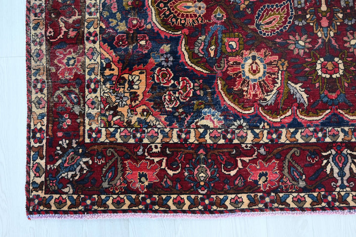 red Large rug 6' 11" x 10' 7"