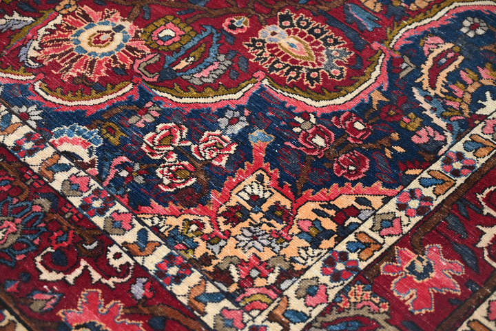 red Large rug 6' 11" x 10' 7"
