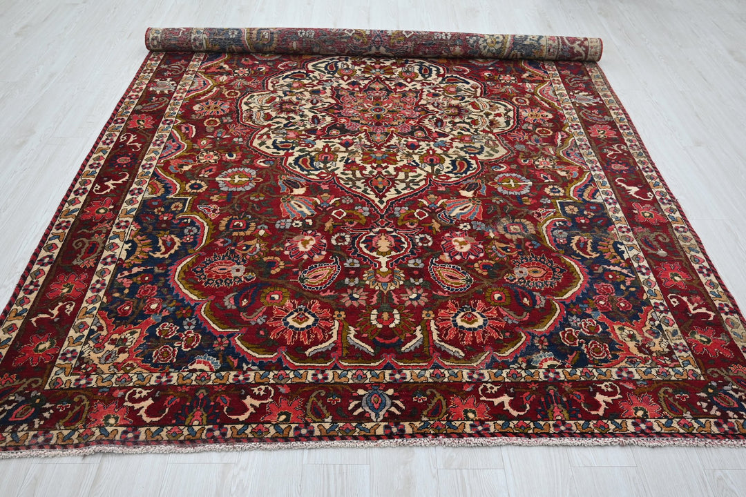 red Large rug 6' 11" x 10' 7"